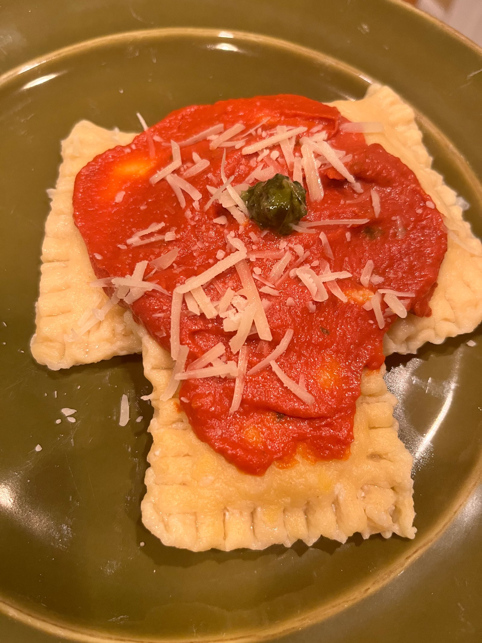 Homemade ravioli with marinara
