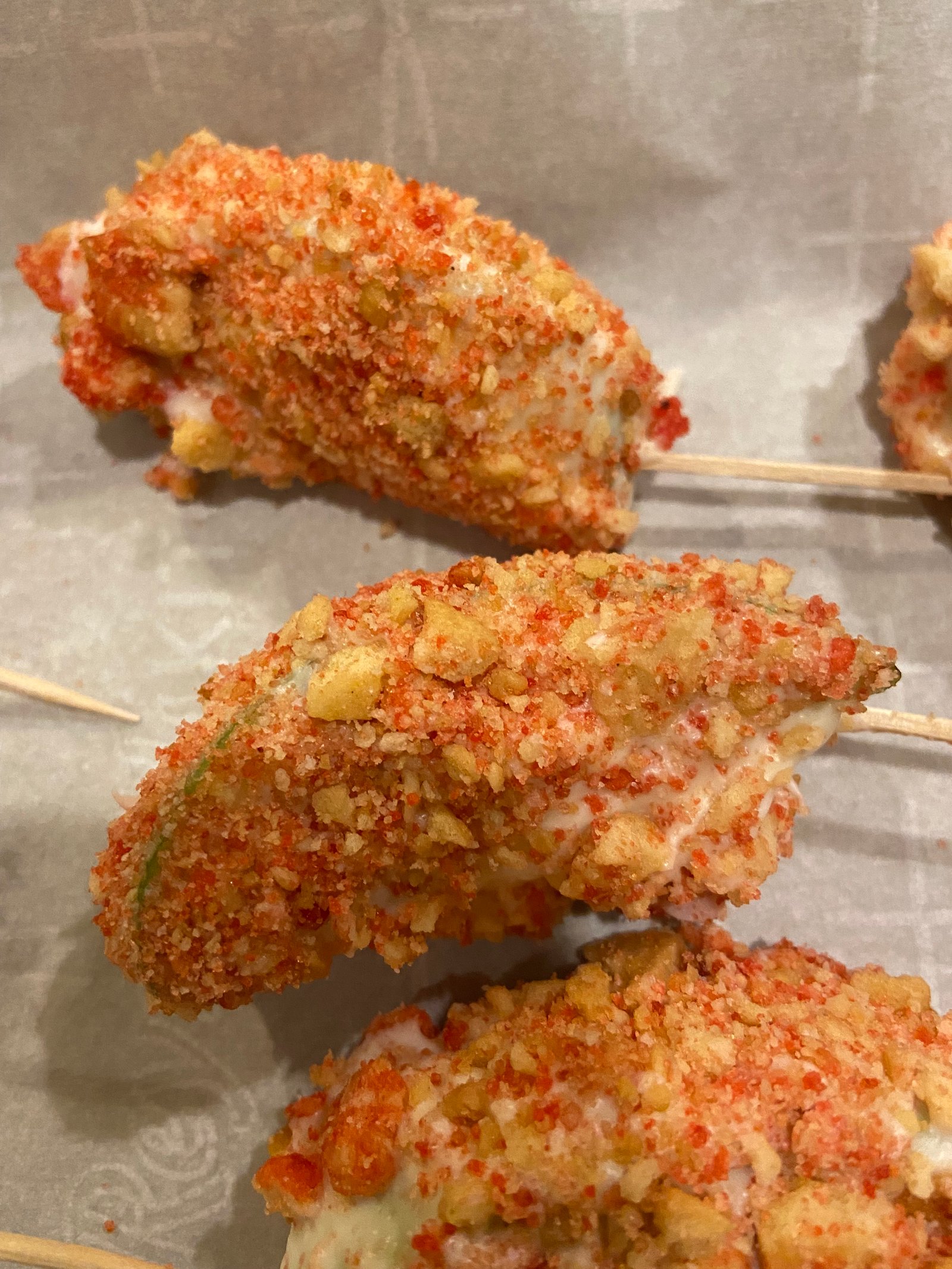 Spicy elote pops